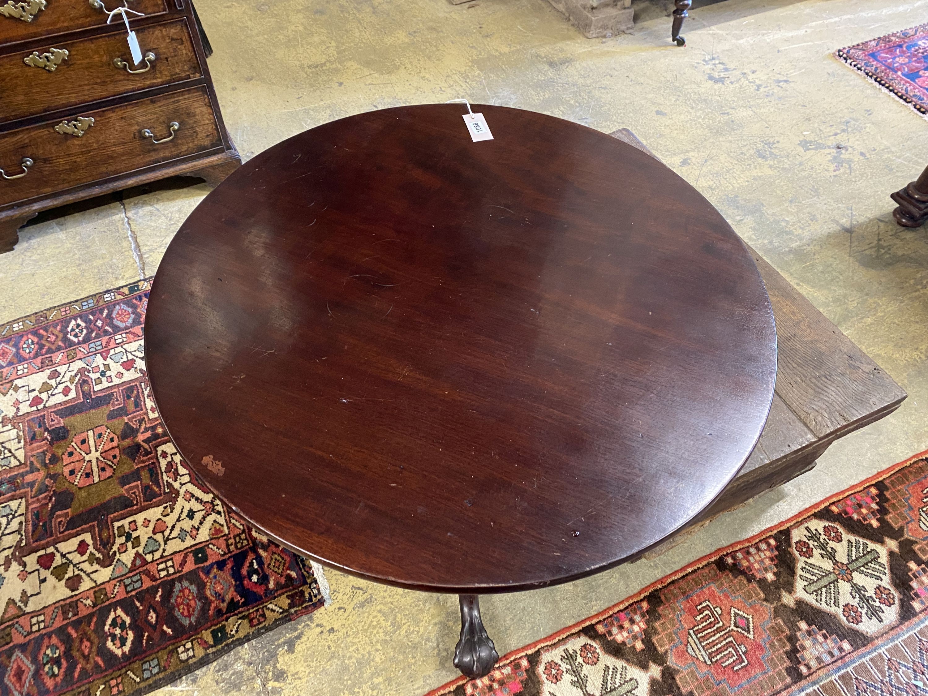 An 18th century mahogany circular bird cage tea table, diameter 84cm, height 71cm